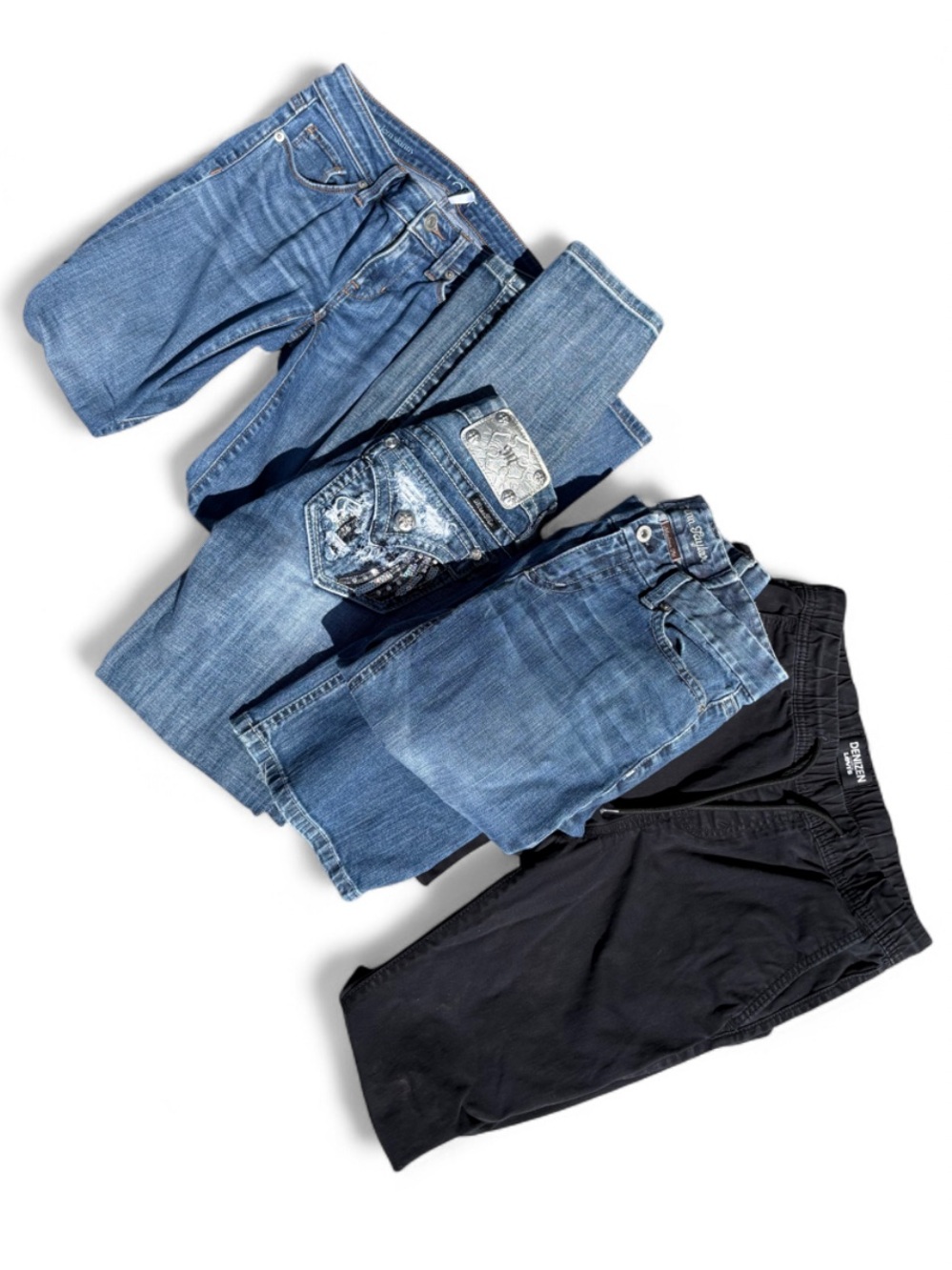 woman's designer jean bundle of 4 pants
embellished Miss Me Levi’s Ann Taylor 24